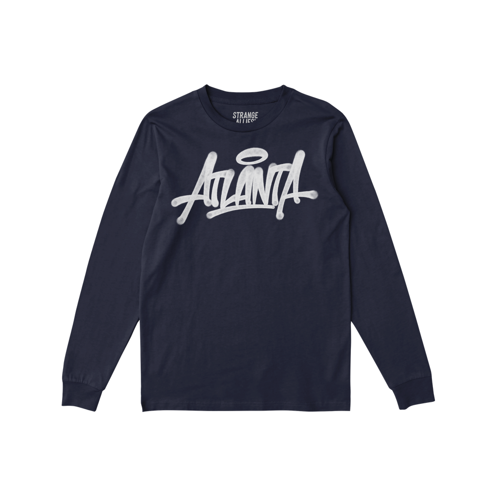 The Atlanta Handstyle T-shirt features a graffiti-style Atlanta script with a halo, embodying street art culture. Ideal for t