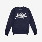 Navy blue Atlanta Handstyle crewneck sweatshirt featuring white graffiti lettering with a halo graphic. The chest reads ATLANTA, embodying city pride and urban artistry.