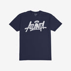 Navy-blue Atlanta Handstyle T-shirt featuring white graffiti script with halo, embodying street art and city pride, ideal for expressing Atlanta culture and individuality through urban-inspired fashion.