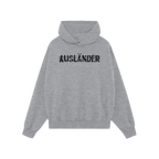 Light-heather gray Ausländer Hoodie with black glitch-style AUSLÄNDER. graphic, front kangaroo pocket, and drawstring hood.