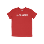 Ausländer T-shirt features a red, short-sleeved design with a distressed white graphic of the word “AUSLÄNDER” crossed