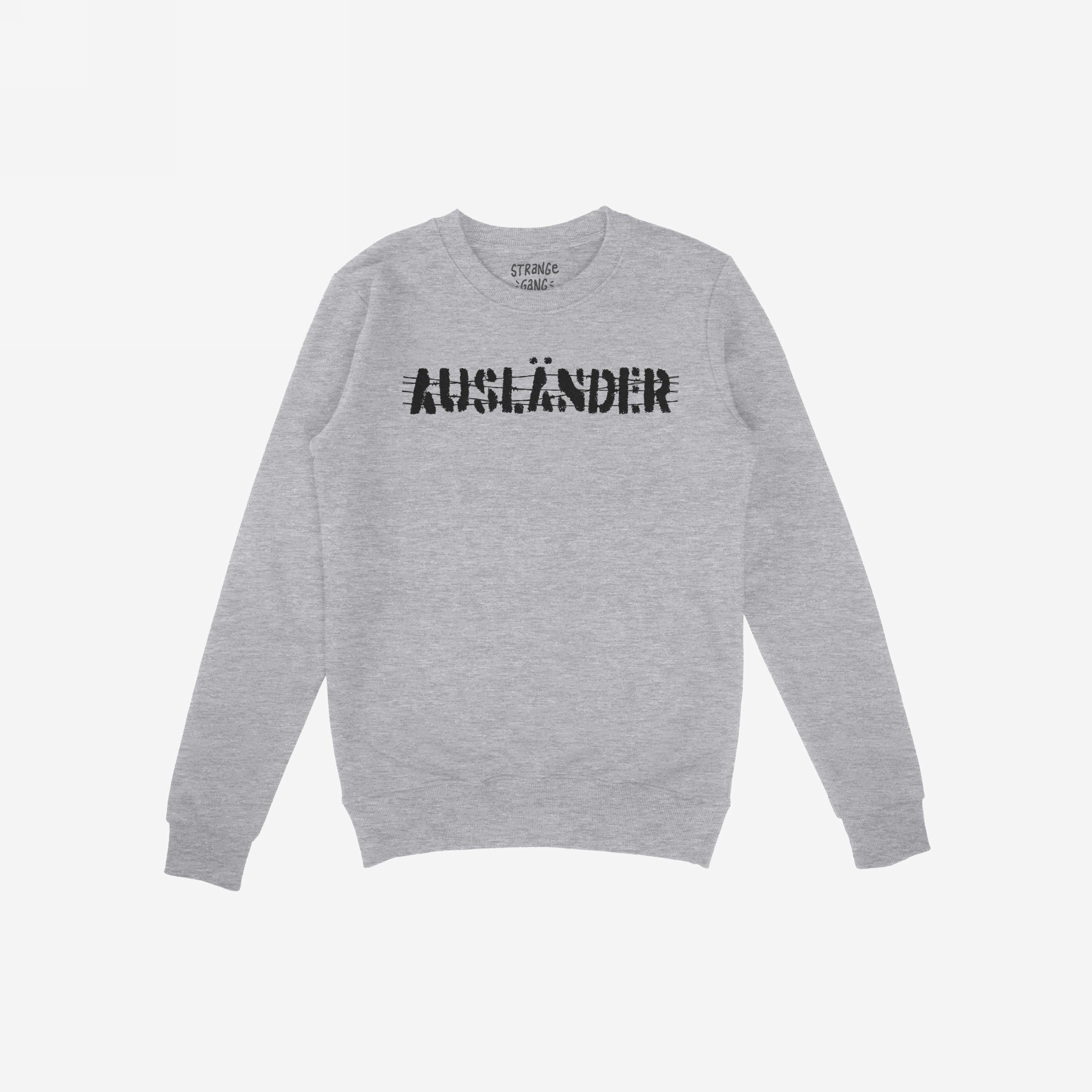 Light-gray long-sleeve crewneck sweatshirt with AUSLÄNDER in distressed black print across the chest, representing empowerment and resilience, part of the Ausländer Hoodie & Sweatshirt collection.