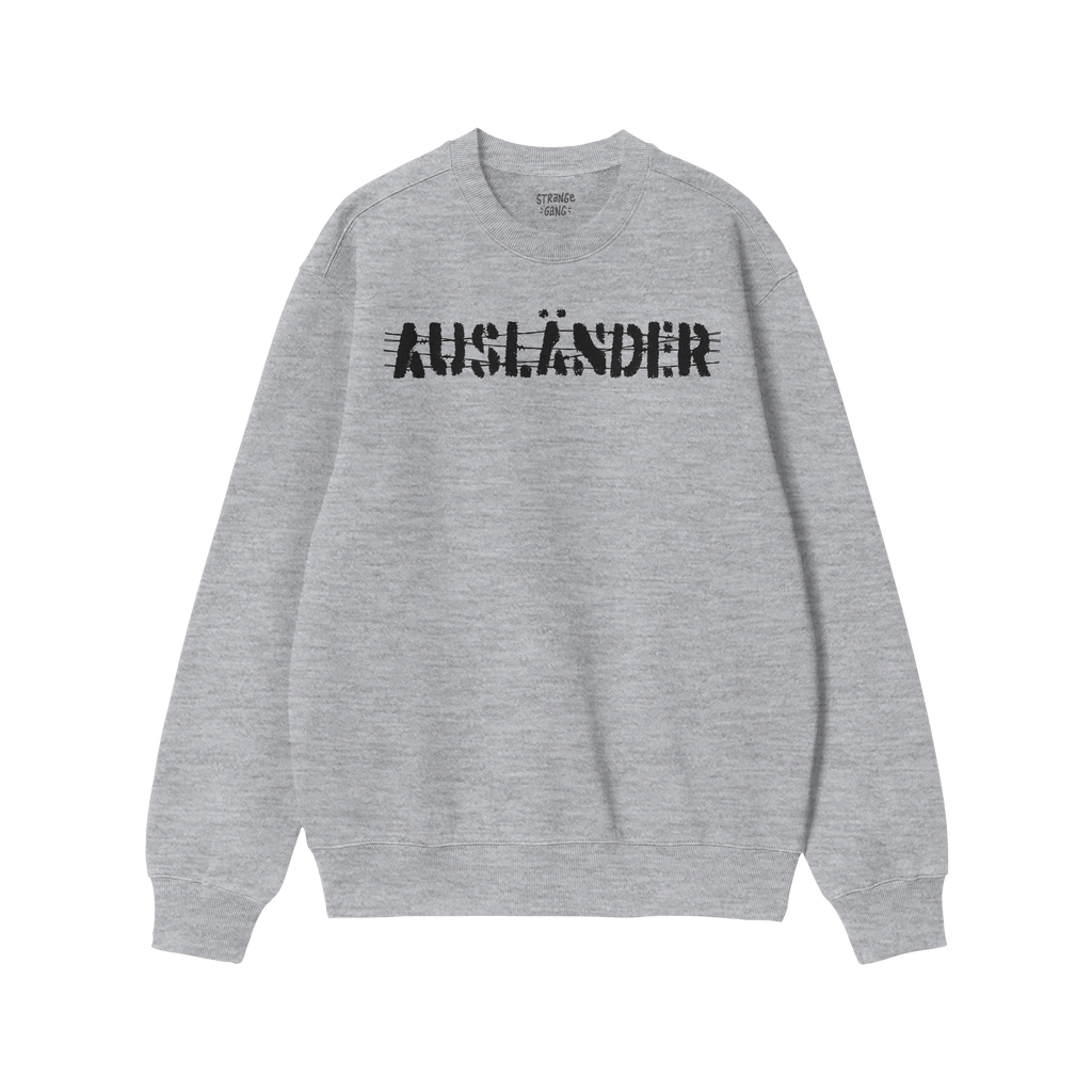 Light-gray long-sleeve crewneck sweatshirt with AUSLÄNDER in distressed black print across the chest, representing empowerme