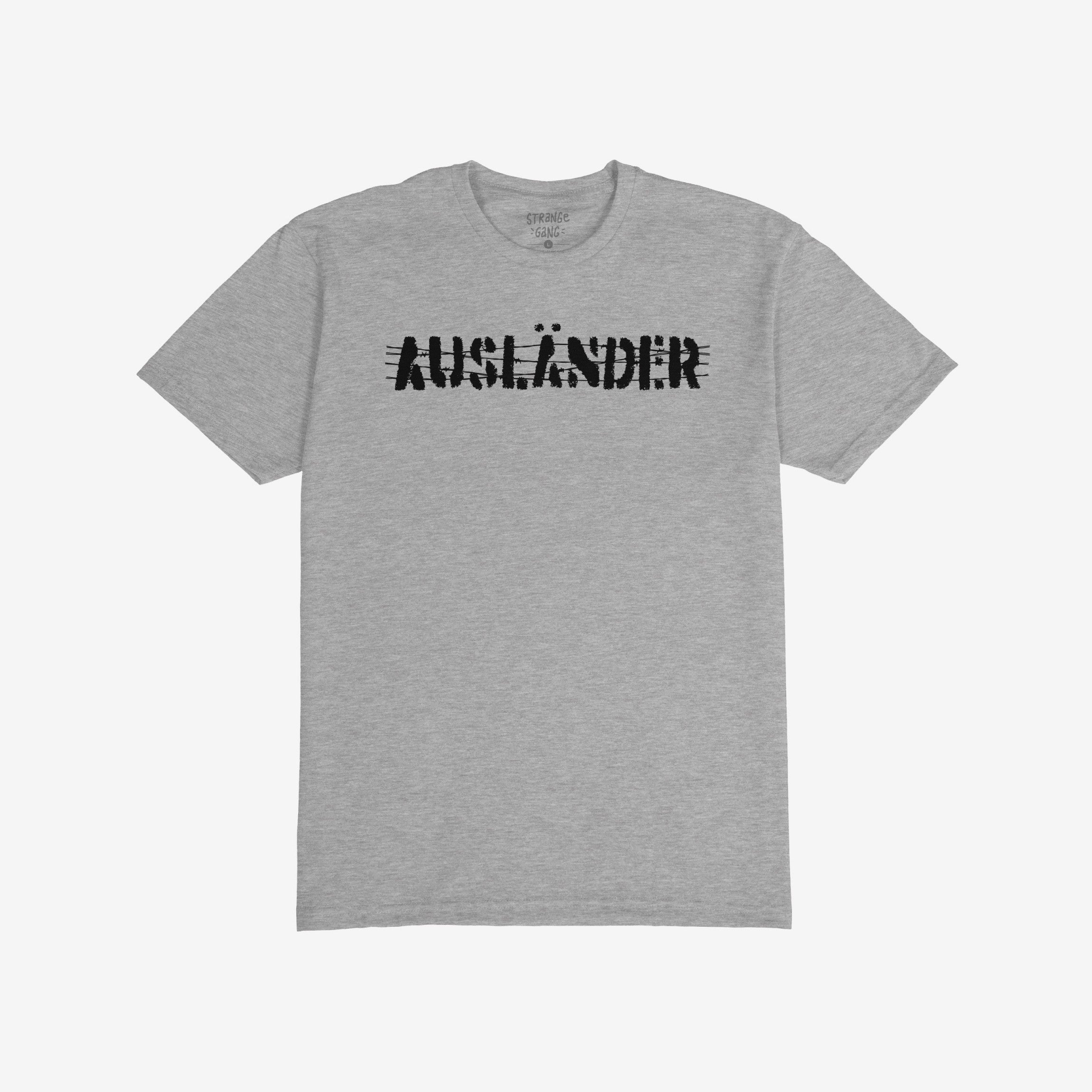Heather-gray crew-neck Ausländer T-shirt with distressed black-ink print, symbolizing resistance and empowerment. The design features a strikethrough effect, embodying defiance against borders and exclusion.