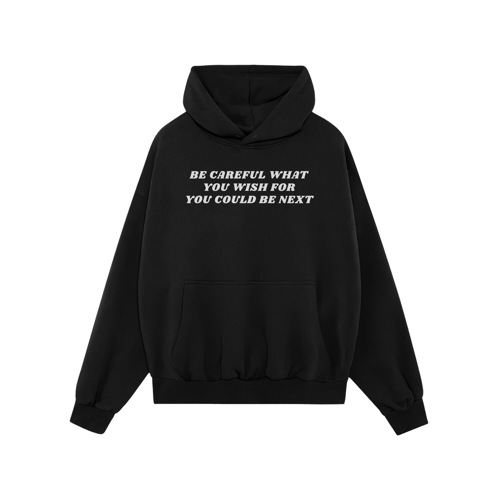 Black pullover Be Careful Shirt features bold white lettering warning against authoritarianism, perfect for making a statemen