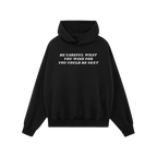 Black pullover Be Careful Shirt features bold white lettering warning against authoritarianism, perfect for making a statemen