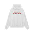 Plain white pullover hoodie featuring bold red text: Be Careful What You Wish For You Could Be Next. This Be Careful Shirt em