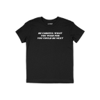 The Be Careful Shirt features bold white text on a black T-shirt, conveying a powerful message against authoritarianism.