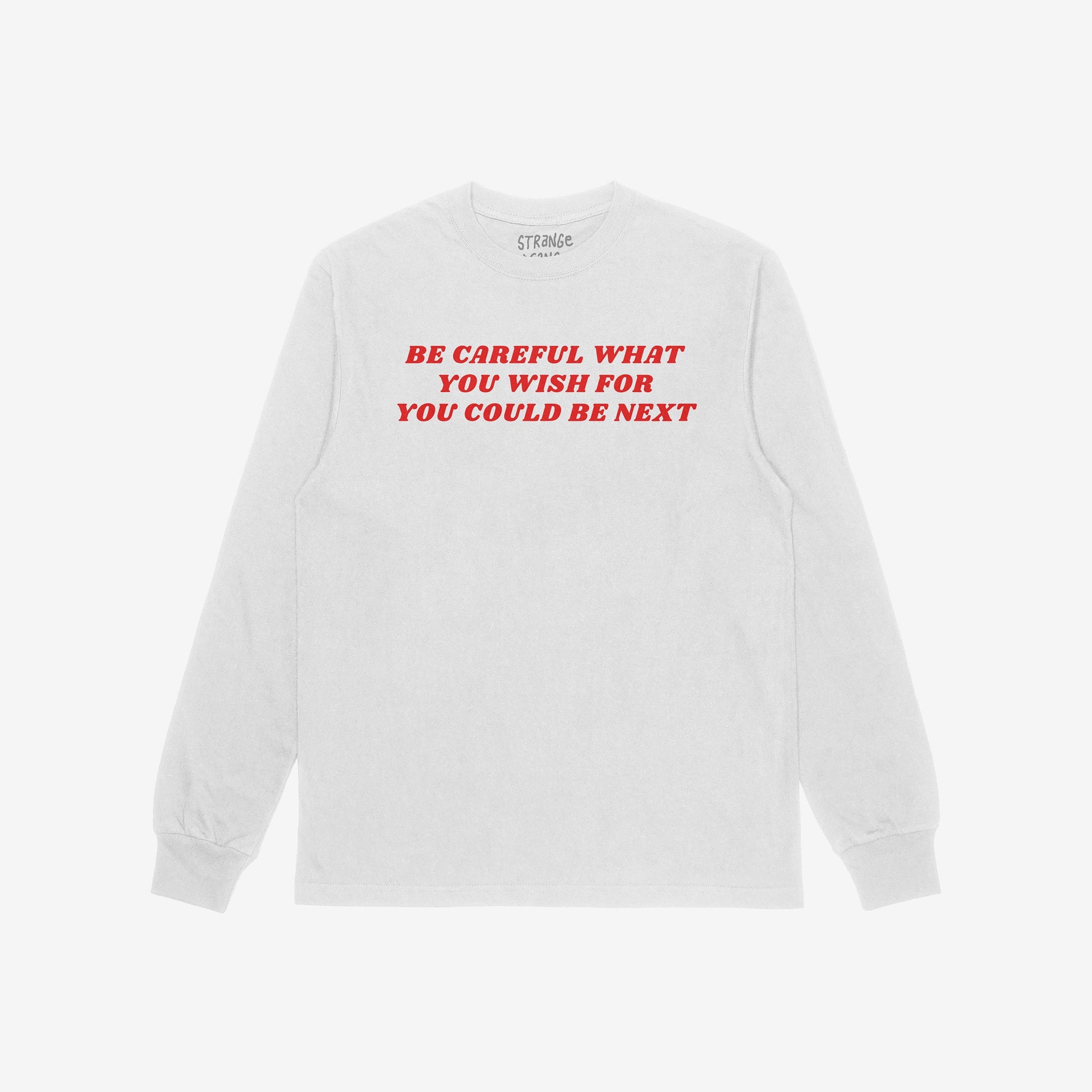 Be Careful T-shirt features bold red lettering on a white long-sleeve, expressing defiance against authoritarianism. The striking slogan challenges and empowers, embodying a rebellious stance against oppressive power.