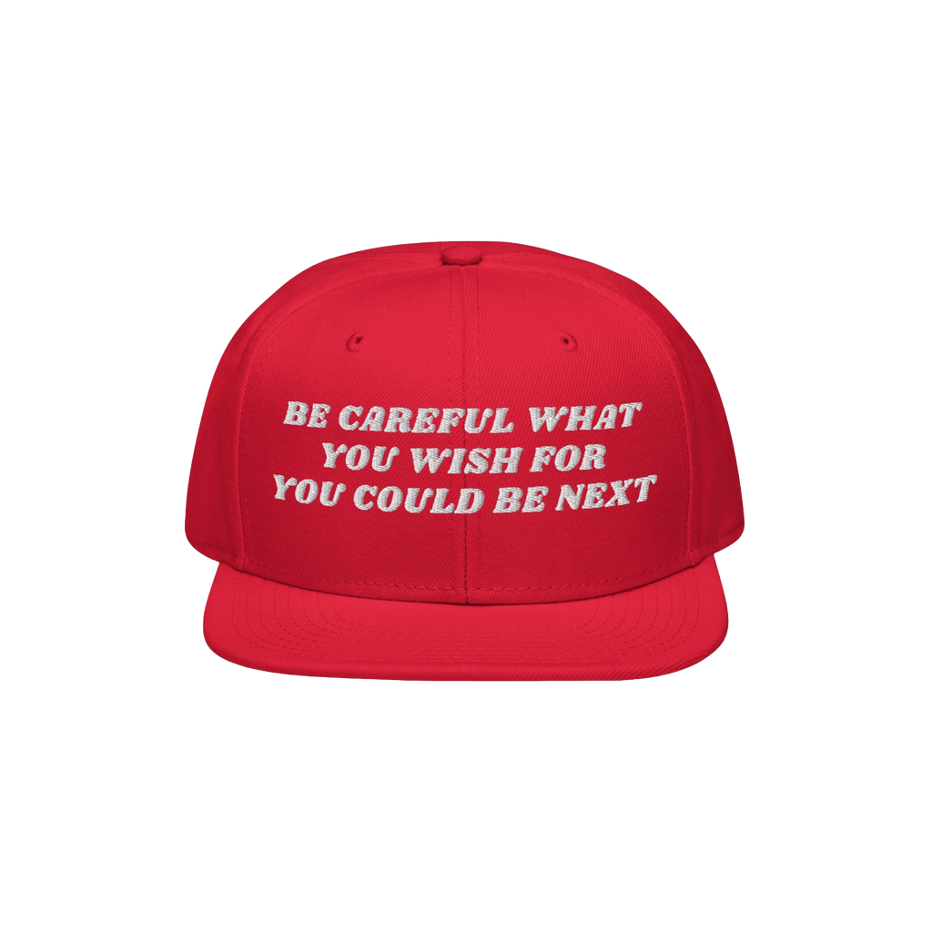 Be Careful Hat featuring bold white embroidery on a red snapback, delivering a political message for anti-fascist activism. I