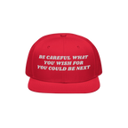 Be Careful Hat featuring bold white embroidery on a red snapback, delivering a political message for anti-fascist activism. I