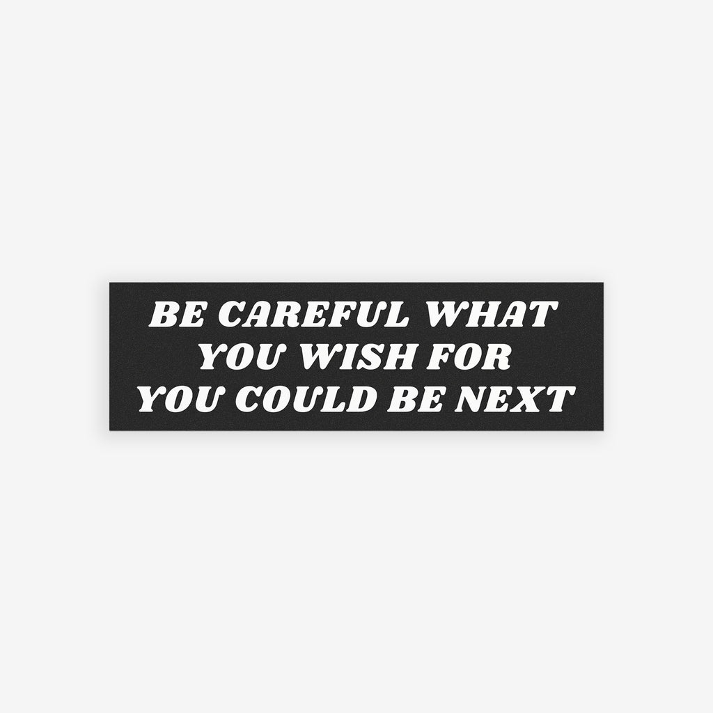 Be Careful Sticker & Magnet featuring a bold message overlay on a crowd, urging awareness. Available as a sticker or magnet, it supports ACLU and advocates against fascism.