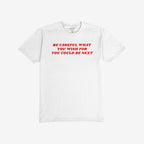The Be Careful Shirt features bold red text warning against authoritarianism, printed on a white crew-neck T-shirt. Inside the collar, a subtle label reflects its rebellious spirit.