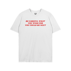 The Be Careful Shirt features bold red text warning against authoritarianism, printed on a white crew-neck T-shirt. Inside th