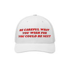The Be Careful Hat features bold red embroidery with a cautionary message, ideal for anti-fascist supporters and activists, c