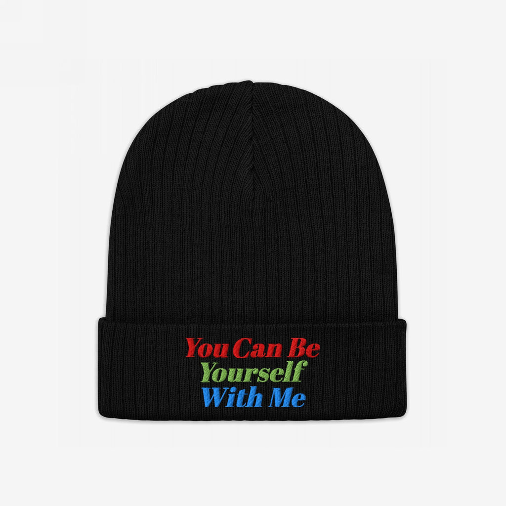 Black rib-knit Be Yourself Hat with a folded cuff, featuring You Can Be Yourself With Me embroidered in red, green, and blue, embodying inclusivity and self-expression.