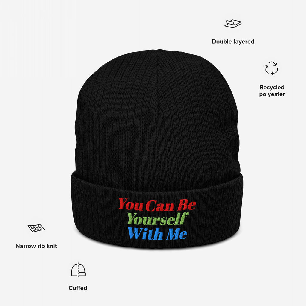 Black Be Yourself Hat with embroidered message You Can Be Yourself With Me in vibrant colors. Features include recycled polyester, double-layered cuffed style, narrow rib knit, embodying bold and inclusive vibes.