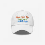 Be Yourself Hat featuring a front-facing design with the slogan You Can Be Yourself With Me embroidered in vibrant type, capturing a message of inclusivity and self-expression.