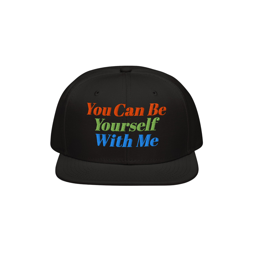 Black flat-brim snapback cap with vibrant embroidered text: You Can Be Yourself With Me. This Be Yourself Hat embodies indivi