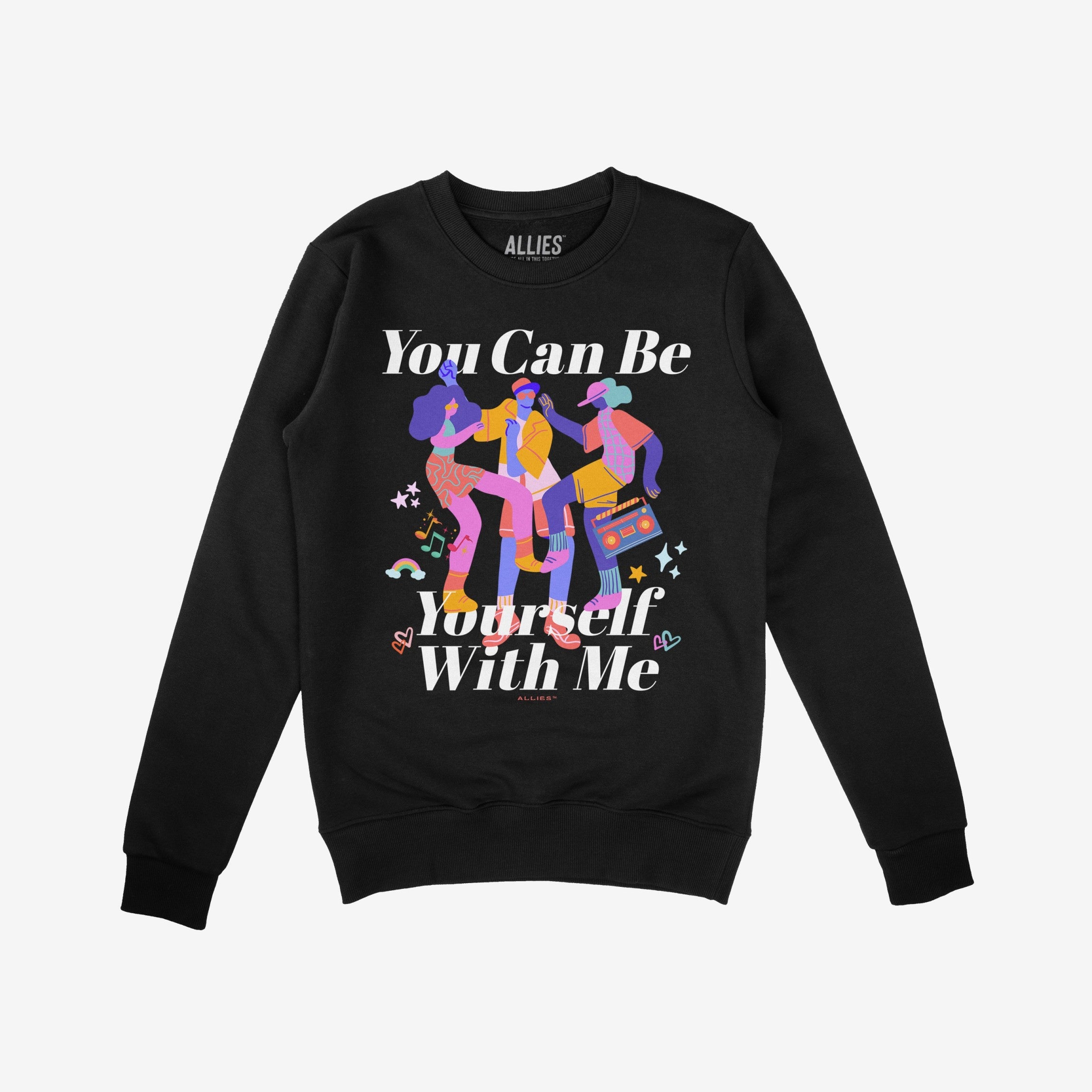 The Be Yourself Shirt features vibrant figures dancing with musical notes and symbols, and the empowering slogan “You Can Be Yourself With Me.”