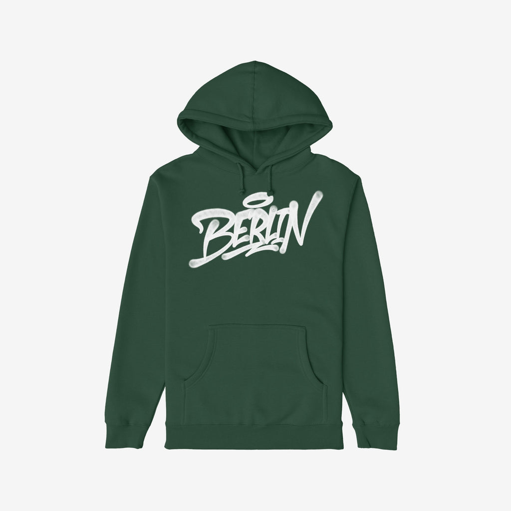 Berlin Handstyle Hoodie: A forest-green pullover with graffiti-style Berlin script, featuring a drawstring hood, kangaroo pocket, ribbed cuffs and hem, embodying urban streetwear culture and bold style.