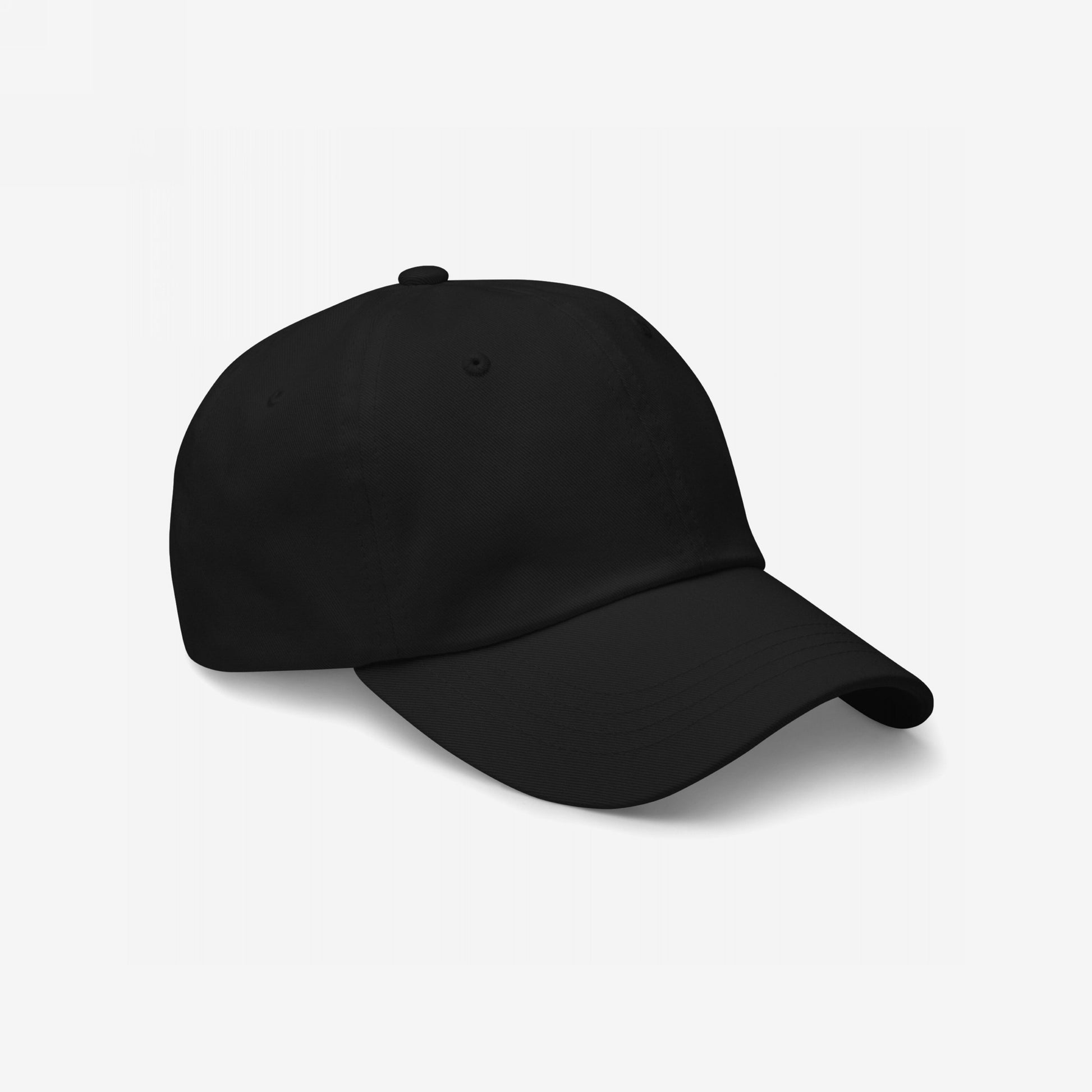 Dad Hat In Custom Colors, featuring a plain black six-panel, curved-bill design, ideal for displaying embroidered anti-fascist or activist messages. Made from soft chino cotton twill with an adjustable strap.
