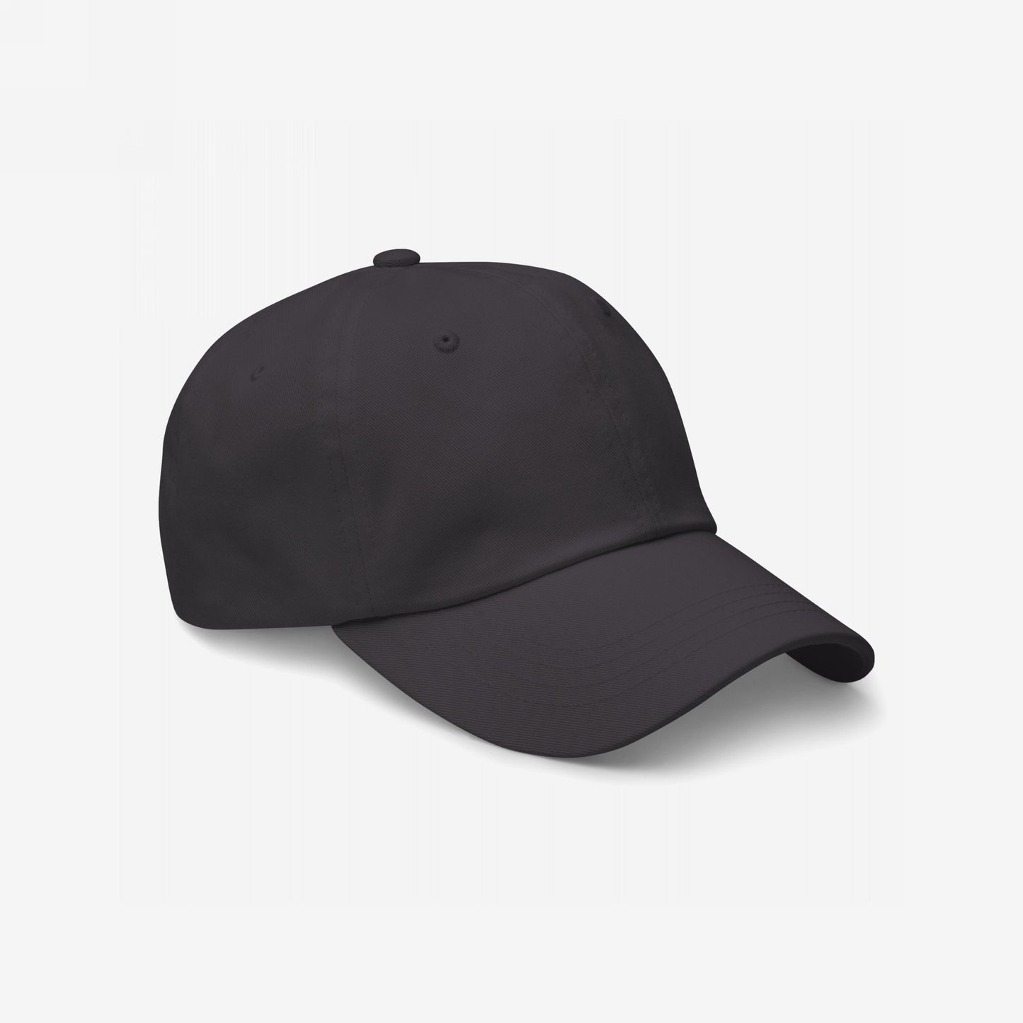 Dad Hat In Custom Colors: A plain black, unstructured six-panel cap with a curved brim and adjustable strap, perfect for anti-fascist or protest embroidery designs, reflecting a casual yet impactful style.