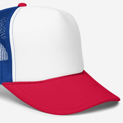 Foam Trucker Hat In Custom Colors with a white front, red visor, and blue mesh back, ideal for personalized activism embroidery. Features a structured crown, retro rope detail, and adjustable snap.