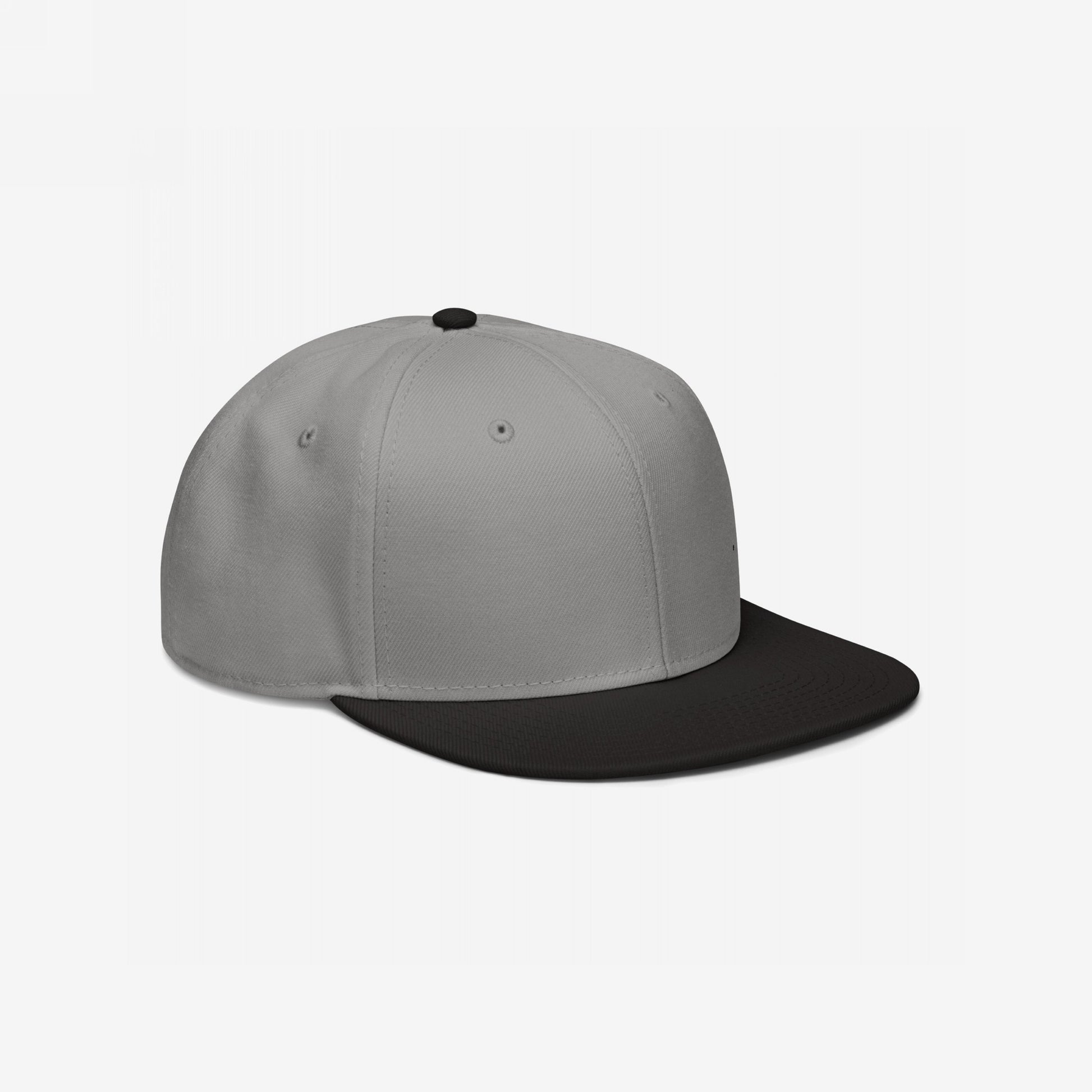 Snapback Hat In Custom Colors: A stylish two-tone cap with a light gray crown and black flat brim, featuring a six-panel design with ventilation eyelets, perfect for showcasing your progressive stance.