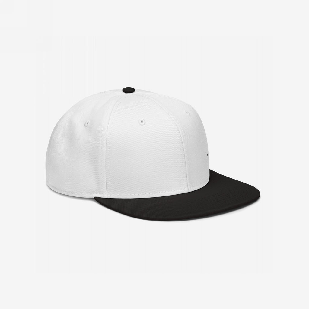 Snapback Hat In Custom Colors: A sleek, structured six-panel cap featuring a white crown and black flat brim, designed for activists and allies to express anti-fascist and progressive messages through custom embroidery.