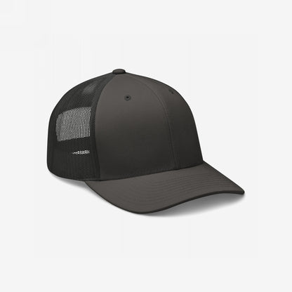 Trucker Hat In Custom Colors featuring a black front panel and bill, with a breathable mesh back, designed for activism and personal expression. Curved visor, adjustable snapback, and structured crown for impactful embroidery.