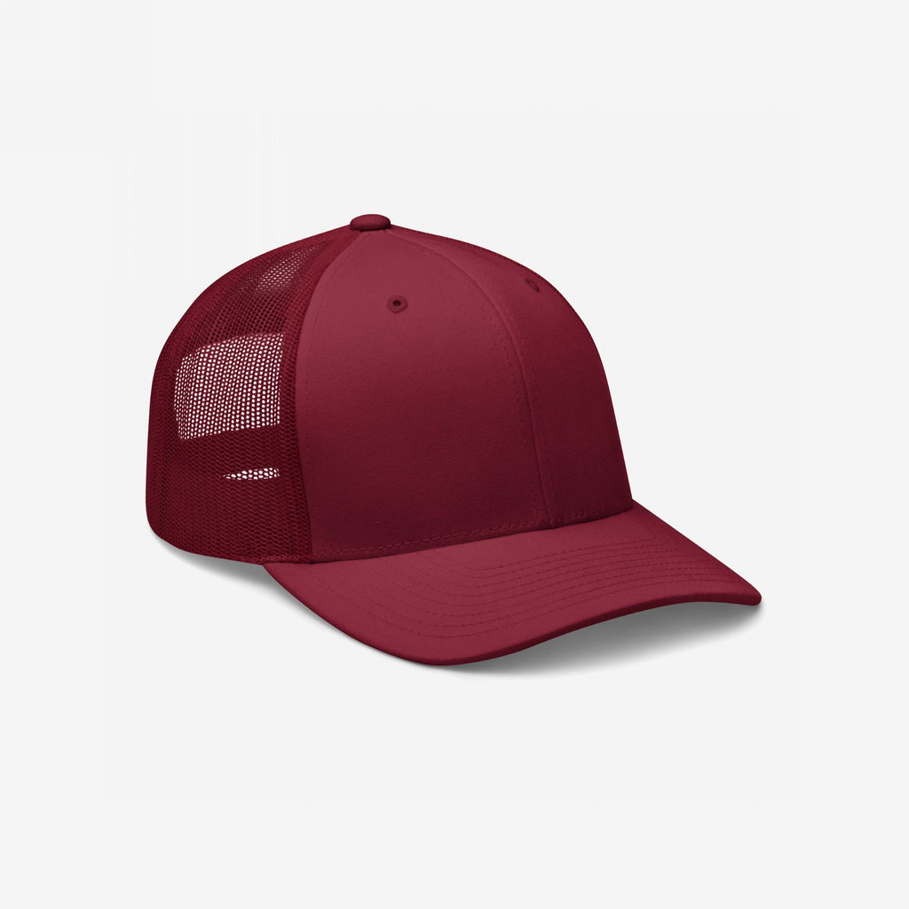 Trucker Hat In Custom Colors features a deep burgundy hue with a structured front, breathable mesh back, and adjustable snapback, embodying bold activism and personalization potential for outspoken individuals.