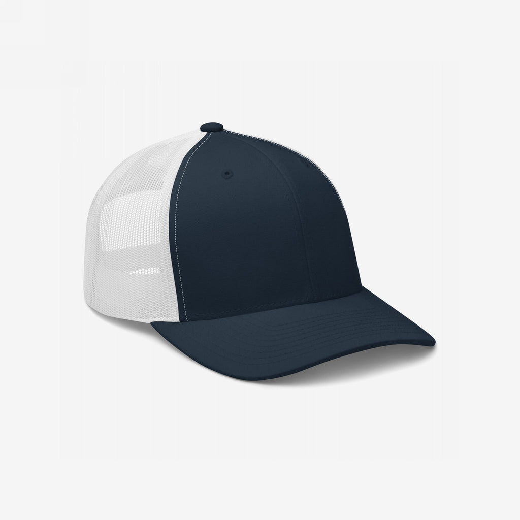 Trucker Hat In Custom Colors: A navy-blue, six-panel cap with a white mesh back and adjustable snapback, designed for bold statements and activism, perfect for personalizing with high-impact embroidery.
