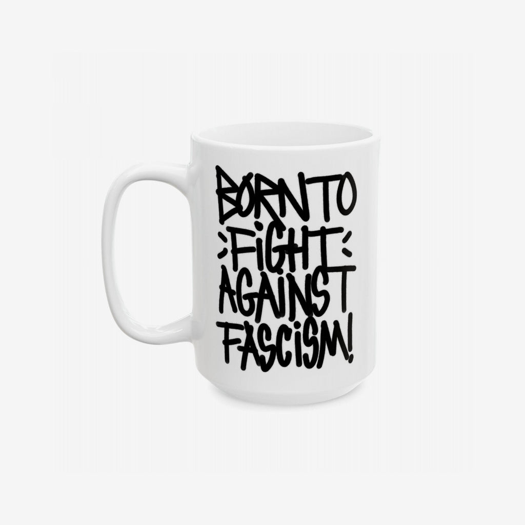 Born To Fight Against Fascism Graffiti Mug featuring bold, hand-lettered slogan in black on durable white ceramic, inspiring resistance with every sip. Perfect for desks, protest kits, and gifting supporters of equality.