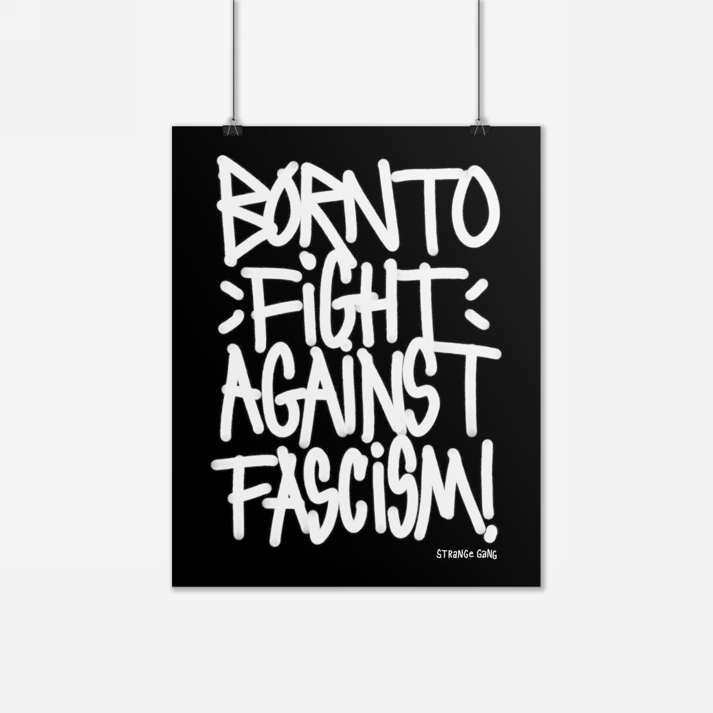 Born To Fight Against Fascism Graffiti Poster features bold, hand-drawn lettering on a black square canvas, embodying a rebellious street art vibe. It's clipped for display, perfect for justice-driven spaces.