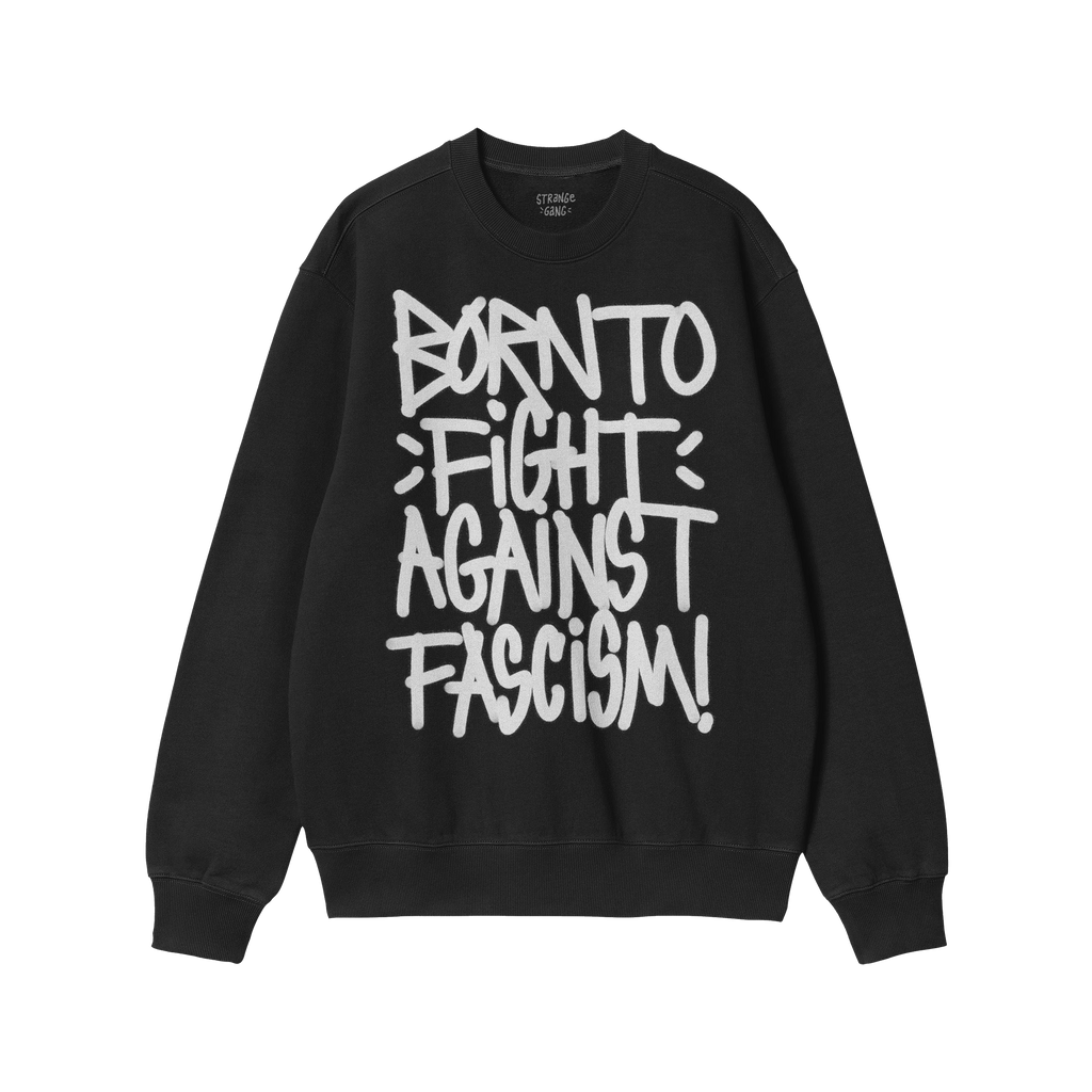 Black crew-neck sweatshirt with bold white graffiti text: “BORN TO FIGHT AGAINST FASCISM!”. Brand label at collar reads �