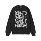 Black crew-neck sweatshirt with bold white graffiti text: “BORN TO FIGHT AGAINST FASCISM!”. Brand label at collar reads �