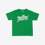 The Boston Handstyle Women's Baby Tee features “Boston” in white graffiti script on a bright green T-shirt, embodying the city's bold energy and rebellious spirit with a touch of urban flair.