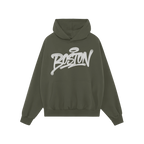 Boston Handstyle Hoodie showcases a dark green pullover with a kangaroo pocket and bold white graffiti-style BOSTON script ac