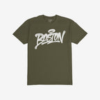 Olive-green Boston Handstyle T-shirt featuring a bold, white graffiti-style BOSTON wordmark with a halo accent, emphasizing urban flair and statement design.