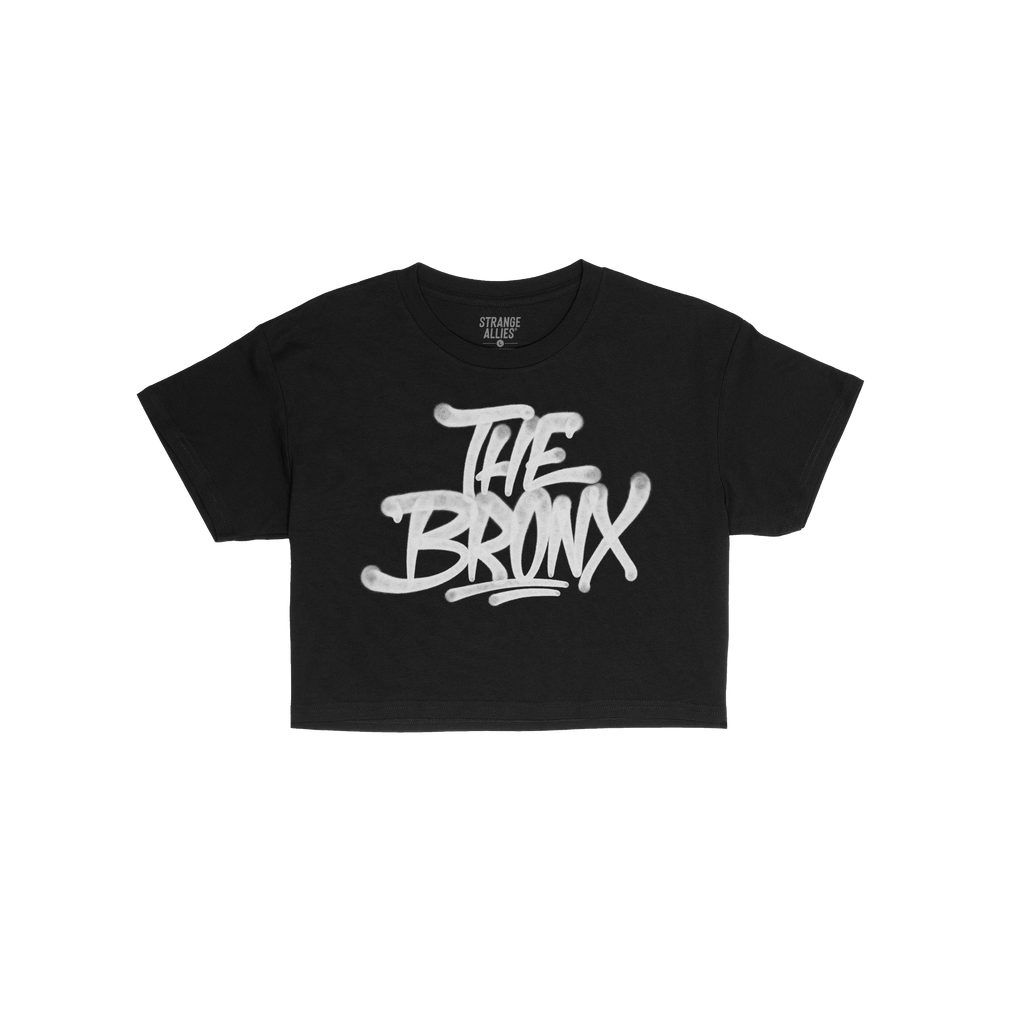 Bronx Handstyle Women's Baby Tee with graffiti-style THE BRONX text, embodying raw borough pride, ideal for NYC souvenirs or 