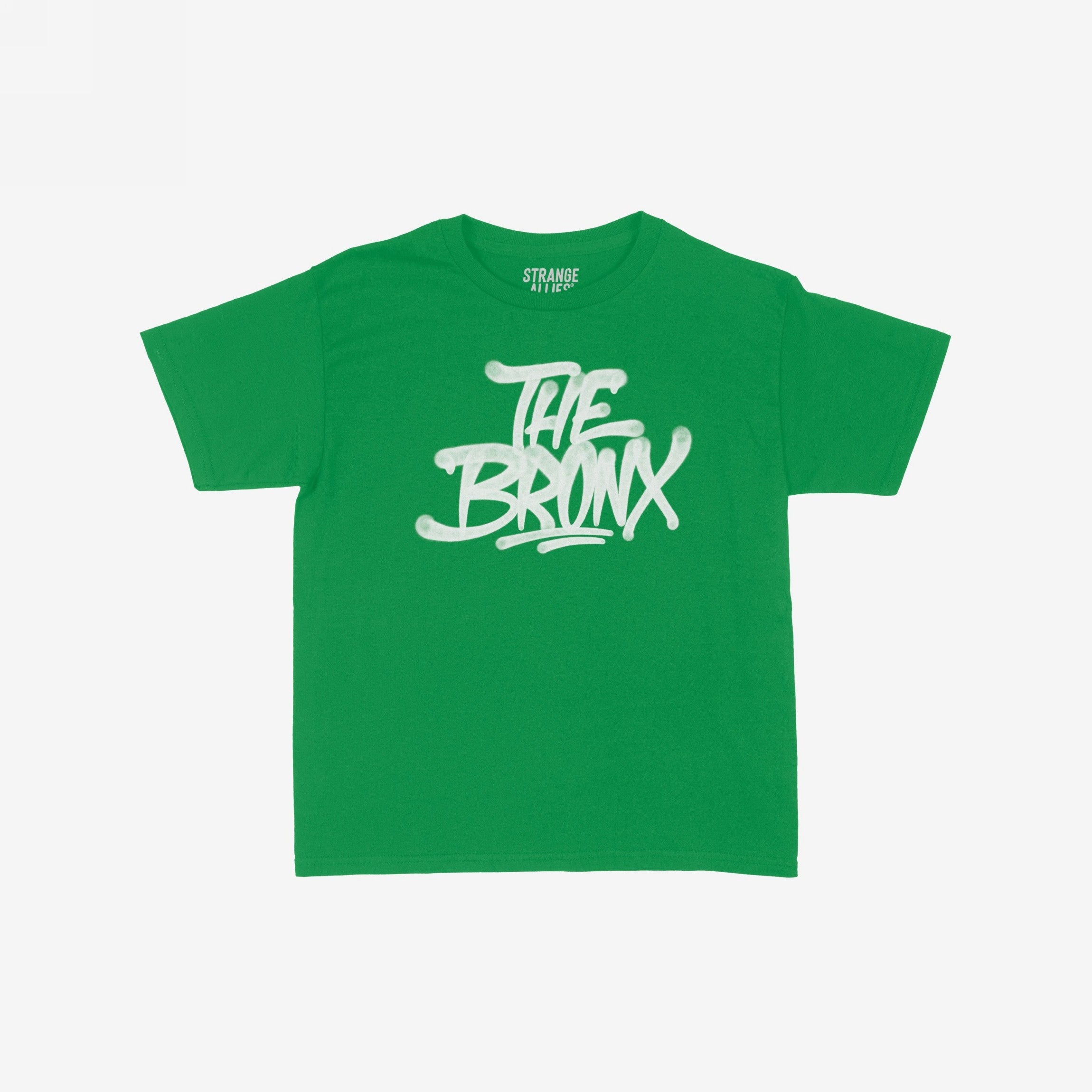 Bronx Handstyle Women's Baby Tee features “THE BRONX” in bold, graffiti-style script on a green short-sleeve shirt, embodying raw borough pride and NYC spirit. Label reads “STRANGE ALLIES.”