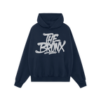 Bronx Handstyle Hoodie, black with a graffiti-style “THE BRONX” print. Features kangaroo pocket and drawstring hood; embo