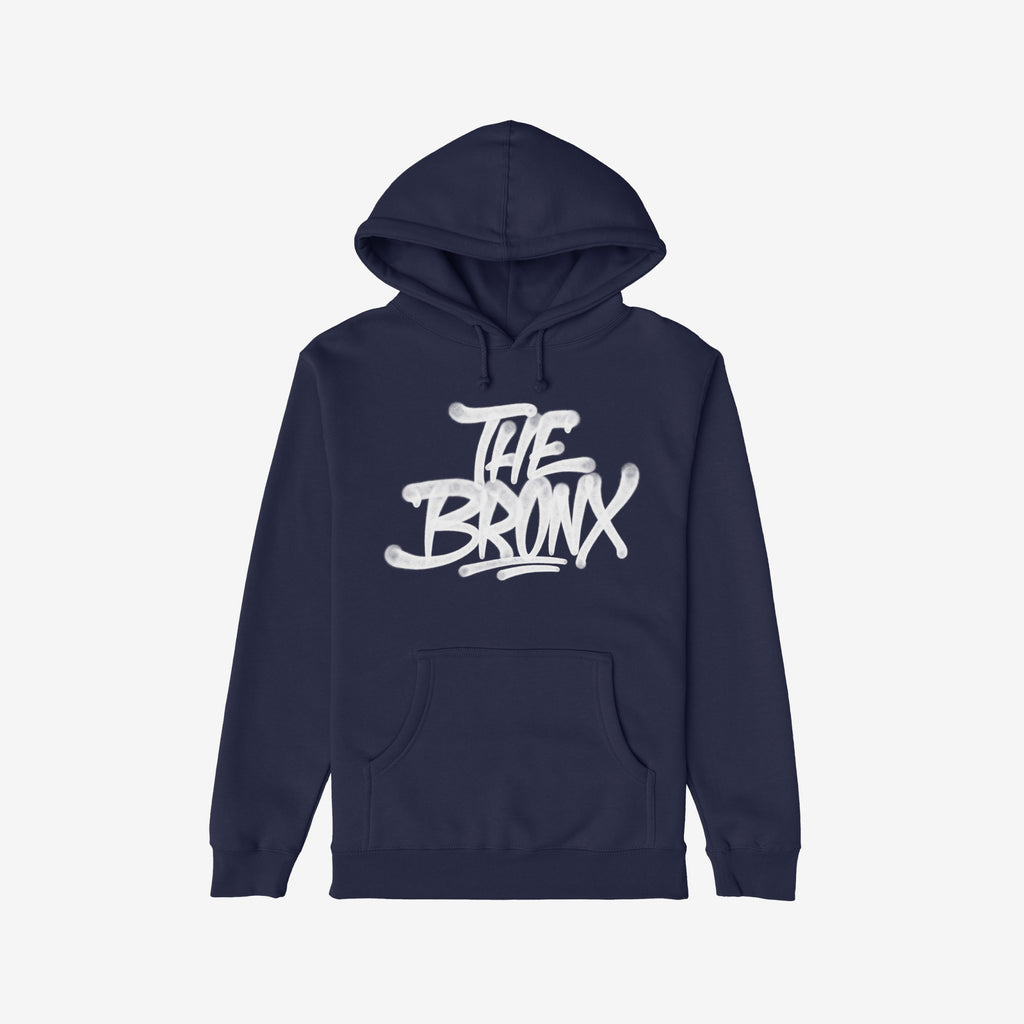 Bronx Handstyle Hoodie & Sweatshirt showcases a dark-navy hoodie with a white graffiti THE BRONX script, embodying raw borough pride and resilience, perfect for NYC winter adventures and sports fans.