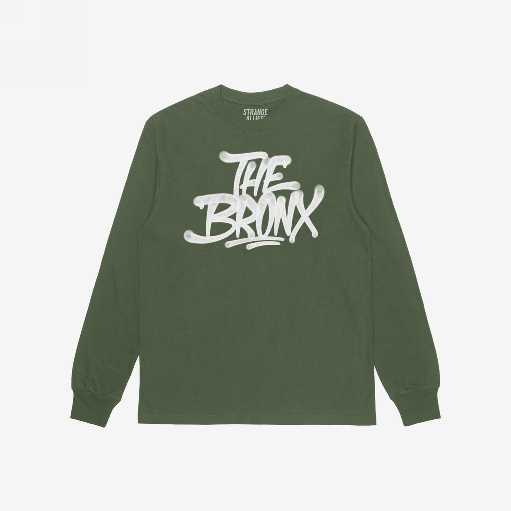 Forest-green Bronx Handstyle T-shirt with white graffiti-style THE BRONX lettering, embodying urban pride and bold expression, perfect for NYC adventures or as a spirited local keepsake.