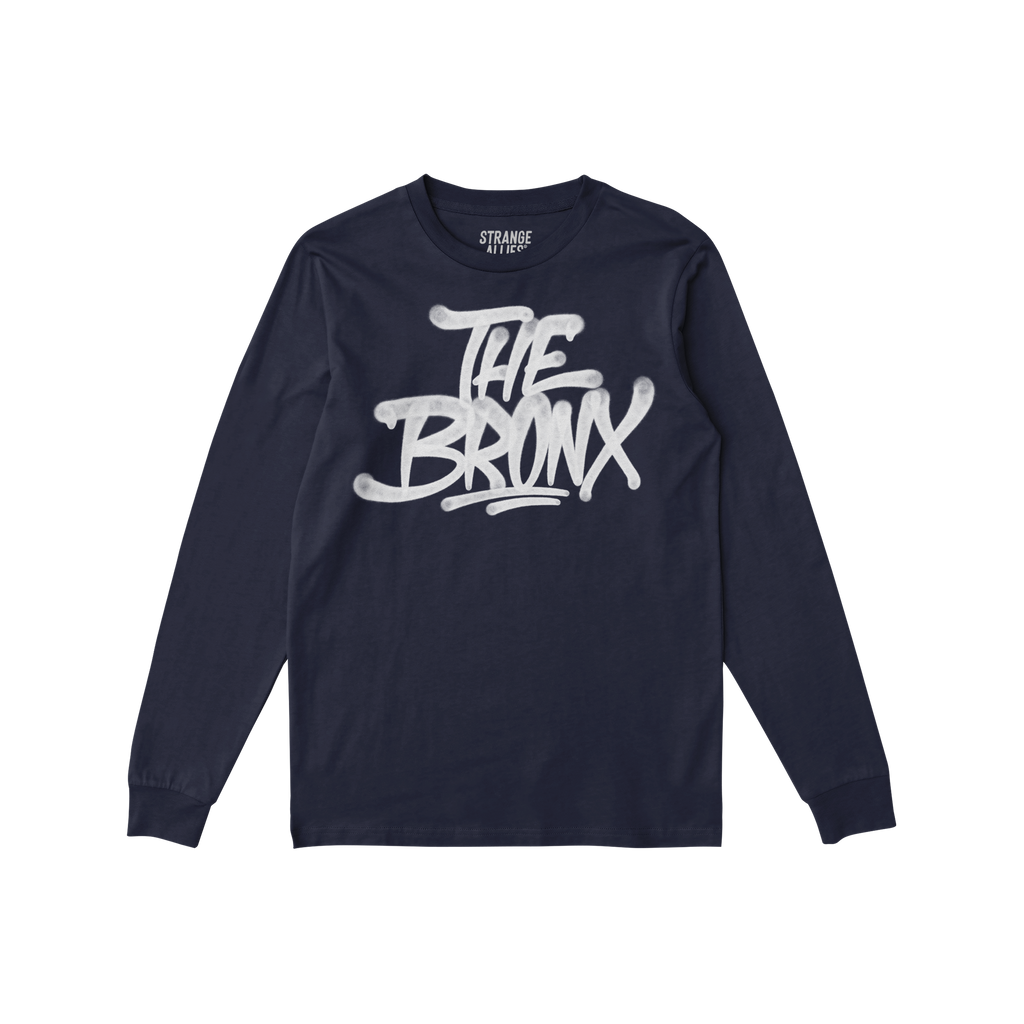Navy Bronx Handstyle T-shirt featuring white graffiti-style THE BRONX lettering with drips, ribbed cuffs, and crew neckline, 