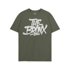 Bronx Handstyle T-shirt featuring bold white graffiti text THE BRONX on olive-green fabric, embodying raw urban pride and reb