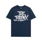 Bronx Handstyle T-shirt featuring a bold, white graffiti-style THE BRONX slogan on a dark navy-blue crew-neck, embodying boro