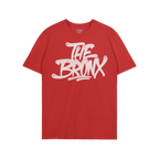 Bronx Handstyle T-shirt features bold “THE BRONX” graffiti in white spray-paint lettering on a red tee, capturing raw bor