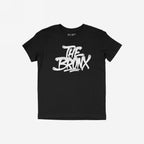 Bronx Handstyle T-shirt featuring a bold, white graffiti-style THE BRONX print on black fabric, capturing urban pride and edgy street art aesthetics, laid flat against a neutral backdrop.